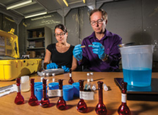 Sandia National Laboratories chemical engineer Vicki Chavez worked with Kevin Fleming to prove that iron sulfate mixed with ammonium nitrate could produce a non-detonable fertilizer. Photo: Randy Montoya
