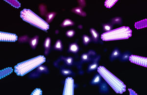 Patterned electron probes enhance precision in measuring tungsten diselenide lattice parameters. Background: complex-shaped electron probe. Foreground: exaggerated diffraction peak changes due to temperature-induced lattice expansion.
