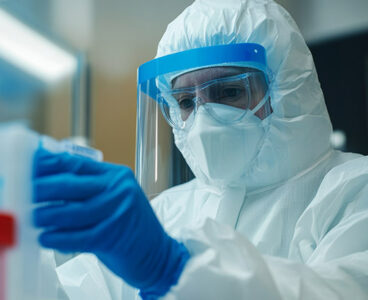 Detailed view of a PCR testing kit for SARS-CoV-2 with an epidemiologist in protective gear analyzing samples to detect specific viral areas causing COVID-19 pneumonia --ar 16:9 --style raw --v 6.1 Job ID: 7e698e8b-3ac0-4058-9c69-cb803819f39e