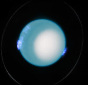 Hubble STIS captured Uranus's aurorae on Oct 10, 2022. Tracking these aurorae over a decade yielded a 1000x more precise measurement of the planet's rotation rate, a vital reference for future research.