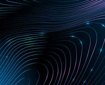 Abstract Background. Luminous flowing lines in blue, purple and teal tones over a dark background, evoking themes of energy and futuristic movement. Copy space