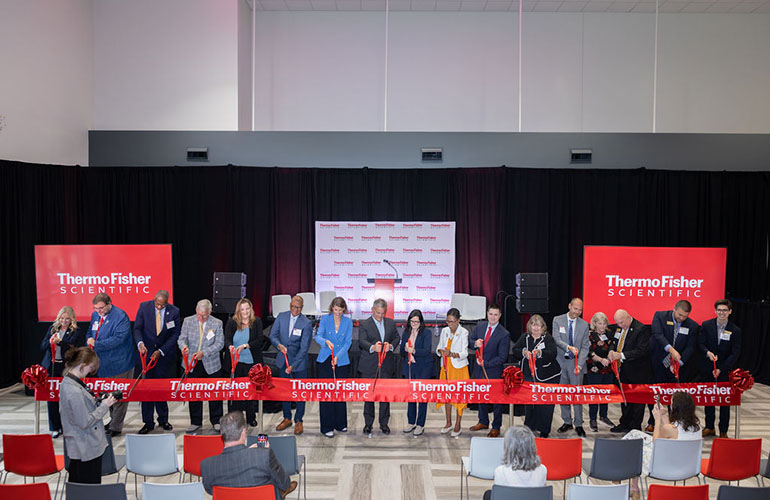 North Carolina Gov. Josh Stein (center) joins Thermo Fisher Scientific executives at the ribbon-cutting for the company's new pipette tip manufacturing facility in Mebane, N.C. The site aims to produce at least 40 million laboratory pipette tips per week, add 100 jobs in manufacturing and operations, and increase domestic supply of consumables for biotech and pharmaceutical research.