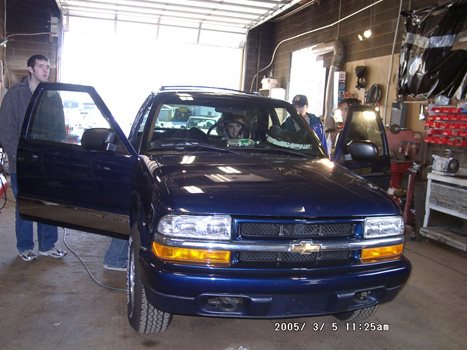 Highlander Racing's autonomous Chevy Blazer prepared for the 2005 DARPA Grand Challenge (photographed Mar. 5, 2005). Photo by Honamos. Public domain. (Wikimedia Commons)