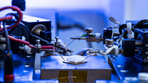 A CHESS-based thermoelectric device under test with visible ice buildup.