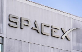 Dec 8, 2019 Hawthorne / Los Angeles / CA / USA - close up of SpaceX (Space Exploration Technologies Corp.) sign at their headquarters; SpaceX is a private American aerospace manufacturer