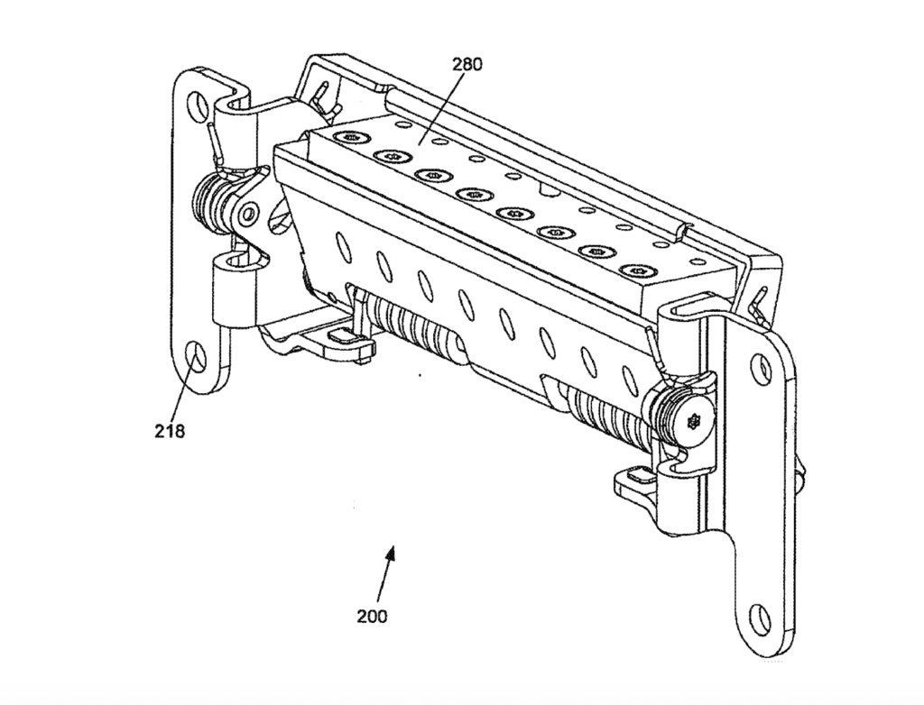 Hinge mechanism with multi-range stop assembly, from U.S. Patent Application No. 2013/0000078 A1, co-invented by John Ternus. The design allows a display to rotate between a normal-travel range and a hidden over-travel range, keeping mounting hardware invisible during everyday use. [Image courtesy of USPTO]