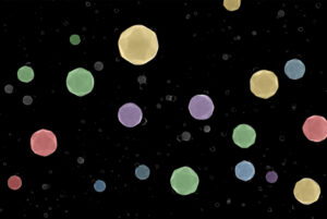 Colored scanning electron microscopy image showing multiple high-index-facet high-entropy alloy nanoparticles. Image courtesy of Northwestern.