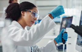 Glass vial, pipette and woman scientist in laboratory for medical study, research or experiment. Test tube, dropper and professional female person with chemical liquid for pharmaceutical innovation